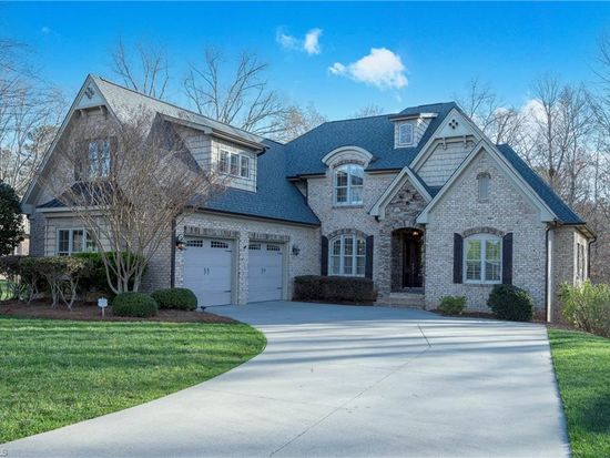 Custom brick craftsman home with three-car garage sold by Rob Herald in the Winston-Salem NC area